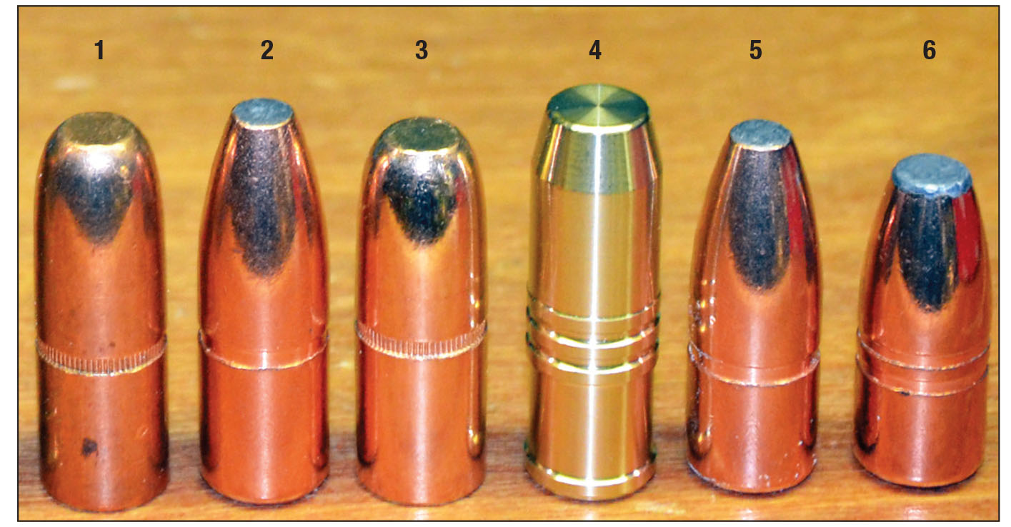 All of these bullets are constructed to perform at .450 Watts velocities and making the correct choice among them depends on which big-game animal is to be hunted. From left: (1) Hornady 500-grain DGS, (2) Swift 500-grain A-Frame, (3) Hornady 480-grain DGS, (4) Cutting Edge 450-grain Safari Solid, (5) Swift 450-grain A-Frame, (6) Swift 400-grain A-Frame.